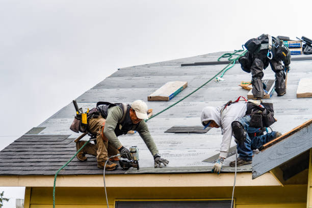 Professional Roof Replacement technician working in Bandon, OR